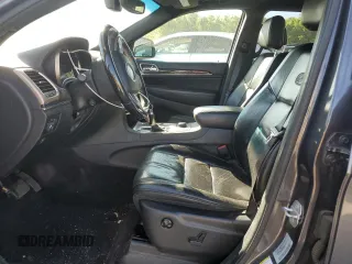 2017 Jeep Grand Cherokee Overland with VIN 1C4RJFCG9HC601806, listed as a Copart auction lot 61786275 with 122,898 mi miles and Salvage title. Bid and sale history available at DreamBid. Image 7.
