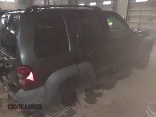 2005 Jeep Liberty Sport with VIN 1J4GL48KX5W691913, listed as a IAAI auction lot 41827572 with 169,313 mi miles and . Bid and sale history available at DreamBid. Image 4.