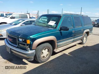 1998 GMC Suburban z VIN 3GKEC16R2WG509363, wystawiony jako IAAI lot #42180155 z przebiegiem 191 066 mil mil oraz . Historia ofert i sprzedaży dostępna na DreamBid. Obrazek 2.