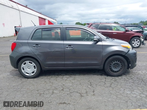 2013 Scion xD with VIN JTKKUPB43D1030172, listed as a IAAI auction lot 42433011 with 102,607 mi miles and . Bid and sale history available at DreamBid. Image 13.