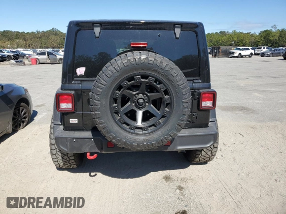 2023 Jeep Wrangler Rubicon z VIN 1C4HJXFN2PW617435, wystawiony jako Copart lot #75409114 z przebiegiem 12 185 mil mil oraz Szkoda całkowita • Salvage title. Historia ofert i sprzedaży dostępna na DreamBid. Obrazek 6.