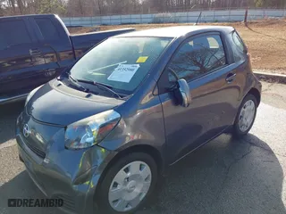 2014 Scion iQ with VIN JTNJJXB00EJ030409, listed as a IAAI auction lot 41352980 with 176,739 mi miles. Bid and sale history available at carsss.com. Image 6.