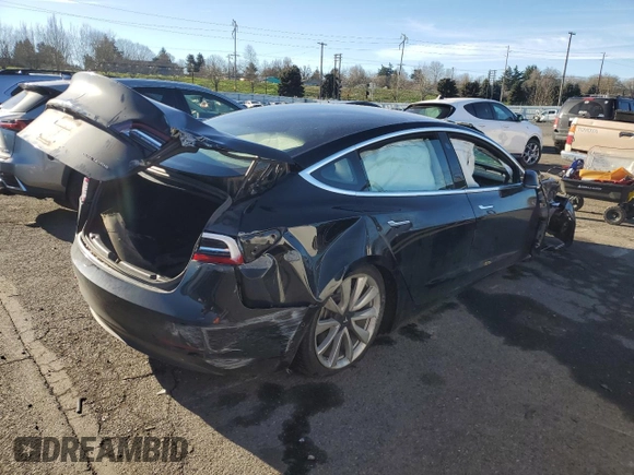 2018 Tesla Model 3 Long Range Battery with VIN 5YJ3E1EB4JF184814, listed as a Copart auction lot 88073115 with Not Provided miles and Salvage Title. Bid and sale history available at DreamBid. Image 3.