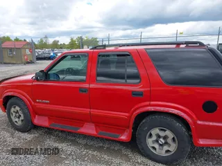 2004 Chevrolet Blazer LS z VIN 1GNDT13X64K127182, wystawiony jako IAAI lot #42188177 z przebiegiem 135 946 mil mil oraz . Historia ofert i sprzedaży dostępna na DreamBid. Obrazek 14.