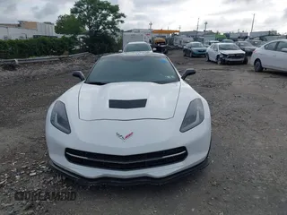2015 Chevrolet Corvette Z51 3LT z VIN 1G1YM2D72F5119618, wystawiony jako IAAI lot #42744702 z przebiegiem Nie podano mil oraz . Historia ofert i sprzedaży dostępna na DreamBid. Obrazek 12.