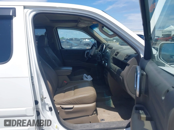 2007 Honda Ridgeline RTL z VIN 2HJYK16537H527957, wystawiony jako IAAI lot #42098143 z przebiegiem 233 163 mil mil oraz . Historia ofert i sprzedaży dostępna na DreamBid. Obrazek 5.