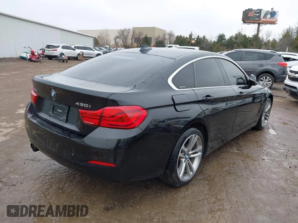2019 BMW 4 Series 430i xDrive with VIN WBA4J3C53KBL08291, listed as a IAAI auction lot 41471858 with 63,933 mi miles. Bid and sale history available at carsss.com. Image 4.
