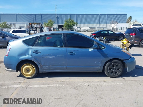 2008 Toyota Prius z VIN JTDKB20U687712324, wystawiony jako IAAI lot #41879892 z przebiegiem 270 900 mil mil oraz . Historia ofert i sprzedaży dostępna na DreamBid. Obrazek 13.