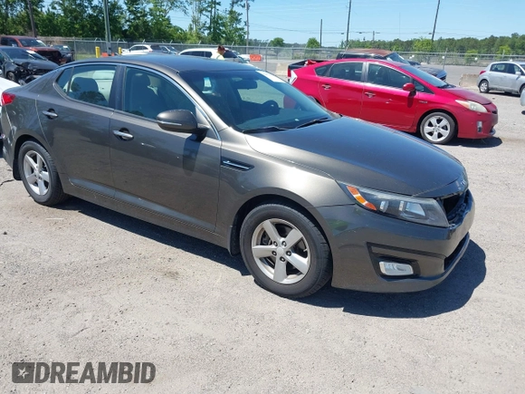 2014 Kia Optima LX with VIN 5XXGM4A71EG335165, listed as a IAAI auction lot 42052378 with 154,574 mi miles. Bid and sale history available at carsss.com. Image 1.