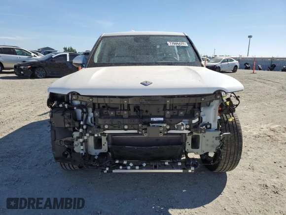 2024 Rivian R1T Adventure z VIN 7FCTGCAA9RN030318, wystawiony jako Copart lot #77036474 z przebiegiem 3 522 mil mil oraz Szkoda całkowita • Salvage title. Historia ofert i sprzedaży dostępna na DreamBid. Obrazek 5.