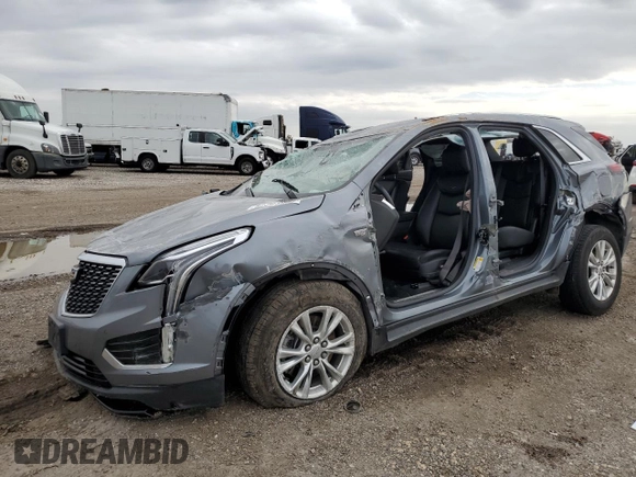 2021 Cadillac XT5 FWD Luxury with VIN 1GYKNAR44MZ192797, listed as a Copart auction lot 87304294 with 0 mi miles and Salvage Title. Bid and sale history available at carsss.com. Image 1.