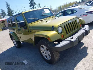 2007 Jeep Wrangler Unlimited Sahara z VIN 1J4GA591X7L206093, wystawiony jako IAAI lot #42043696 z przebiegiem 162 197 mil mil oraz . Historia ofert i sprzedaży dostępna na DreamBid. Obrazek 1.