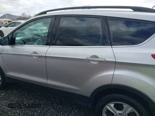 2014 Ford Escape SE with VIN 1FMCU9GX3EUD05447, listed as a IAAI auction lot 41817513 with 155,101 mi miles. Bid and sale history available at carsss.com. Image 14.