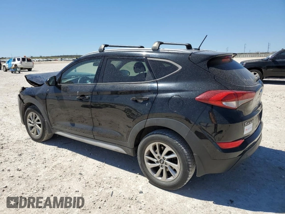 2017 Hyundai Tucson SE with VIN KM8J33A40HU409713, listed as a Copart auction lot 50105805 with 100,463 mi miles and Salvage Title. Bid and sale history available at DreamBid. Image 2.