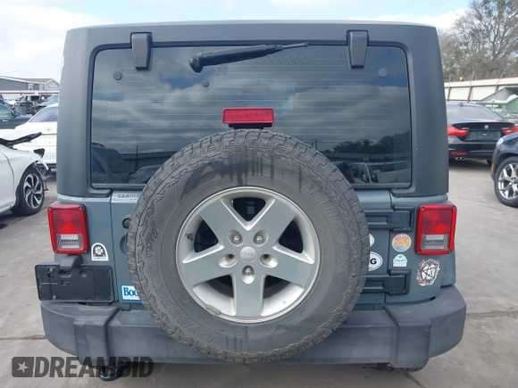 2014 Jeep Wrangler Sport with VIN 1C4AJWAGXEL177449, listed as a IAAI auction lot 41741519 with 117,056 mi miles and . Bid and sale history available at carsss.com. Image 16.