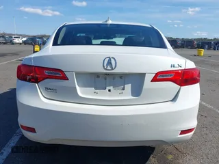 2014 Acura ILX Premium z VIN 19VDE1F57EE010379, wystawiony jako IAAI lot #41886882 z przebiegiem 174 731 mil mil oraz . Historia ofert i sprzedaży dostępna na DreamBid. Obrazek 16.