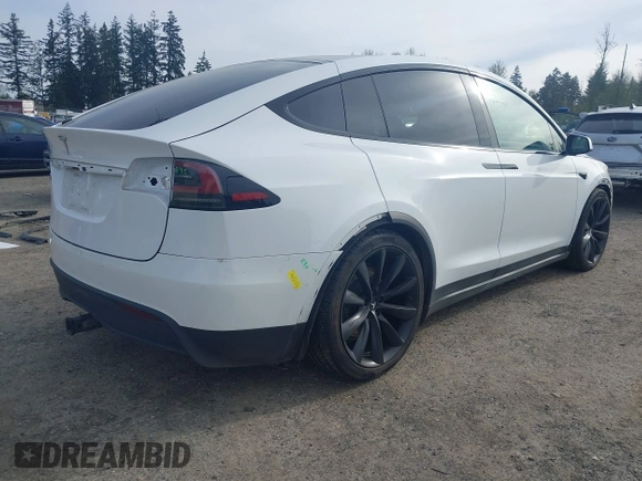2022 Tesla Model X with VIN 7SAXCBE54NF363113, listed as a IAAI auction lot 41978397 with 27,166 mi miles. Bid and sale history available at carsss.com. Image 4.