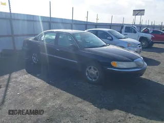 2001 Lincoln Continental with VIN 1LNHM97V41Y716010, listed as a IAAI auction lot 41470767 with 163,092 mi miles. Bid and sale history available at carsss.com. Image 1.