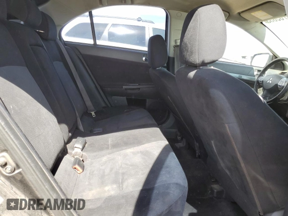 2009 Mitsubishi Lancer z VIN JA3AX88W99U613116, wystawiony jako Copart lot #58765855 z przebiegiem 256 289 mil mil oraz Czysty tytuł • Clean title. Historia ofert i sprzedaży dostępna na DreamBid. Obrazek 10.