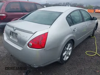 2004 Nissan Maxima SL with VIN 1N4BA41E14C802963, listed as a IAAI auction lot 41852156 with 112,855 mi miles. Bid and sale history available at carsss.com. Image 4.