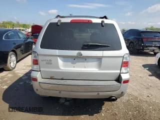2009 Mercury Mariner Premier z VIN 4M2CU87769KJ11358, wystawiony jako Copart lot #55577235 z przebiegiem 206 627 mil mil oraz Szkody całkowita. Historia ofert i sprzedaży dostępna na DreamBid. Obrazek 6.