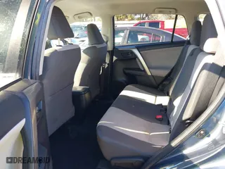 2014 Toyota RAV4 LE with VIN JTMZFREVXED029505, listed as a IAAI auction lot 40916384 with 142,408 mi miles. Bid and sale history available at carsss.com. Image 8.