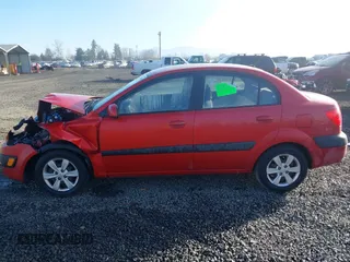 2009 Kia Rio LX with VIN KNADE223796485606, listed as a IAAI auction lot 41676881 with 58,852 mi miles and . Bid and sale history available at DreamBid. Image 14.