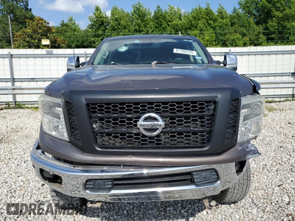 2017 Nissan Titan SL z VIN 1N6BA1F27HN547900, wystawiony jako Copart lot #61768145 z przebiegiem 148 383 mil mil oraz Szkoda całkowita • Salvage title. Historia ofert i sprzedaży dostępna na DreamBid. Obrazek 5.