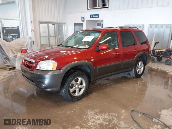 2006 Mazda Tribute S with VIN 4F2YZ06196KM14531, listed as a IAAI auction lot 41594920 with 297,204 mi miles and . Bid and sale history available at carsss.com. Image 2.