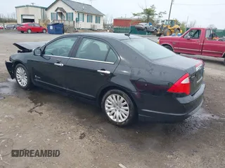 2010 Ford Fusion Hybrid with VIN 3FADP0L38AR263525, listed as a IAAI auction lot 41952084 with 112,681 mi miles. Bid and sale history available at carsss.com. Image 3.