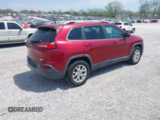 2014 Jeep Cherokee Altitude with VIN 1C4PJMCB7EW185958, listed as a IAAI auction lot 42002583 with 118,256 mi miles and . Bid and sale history available at DreamBid. Image 4.