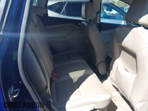 2015 Ford Escape Titanium with VIN 1FMCU0J93FUC20745, listed as a IAAI auction lot 41781551 with 174,538 mi miles and . Bid and sale history available at DreamBid. Image 8.