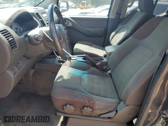 2012 Nissan Frontier Pro-4X z VIN 1N6AD0EV2CC463724, wystawiony jako Copart lot #47106655 z przebiegiem 172 005 mil mil oraz Szkoda całkowita • Salvage title. Historia ofert i sprzedaży dostępna na DreamBid. Obrazek 7.