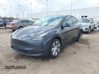 2024 Tesla Model Y Long Range with VIN 7SAYGDEE0RA261489, listed as a IAAI auction lot 41729325 with 5,060 mi miles. Bid and sale history available at carsss.com. Image 21.