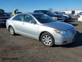 2007 Toyota Camry CE with VIN JTNBE46K373018216, listed as a IAAI auction lot 41737743 with 125,247 mi miles. Bid and sale history available at carsss.com. Image 1.