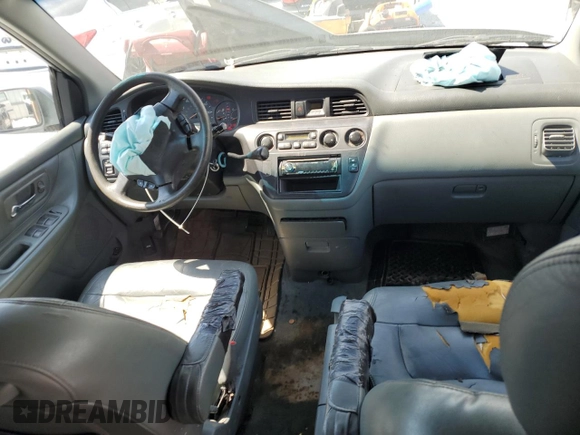 2002 Honda Odyssey EX-L with VIN 2HKRL18962H552809, listed as a Copart auction lot 63631115 with 224,019 mi miles and Salvage title. Bid and sale history available at DreamBid. Image 8.