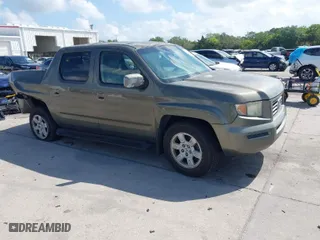 2007 Honda Ridgeline RTL w/Leather with VIN 2HJYK16527H547522, listed as a IAAI auction lot 41939603 with 127,899 mi miles. Bid and sale history available at carsss.com. Image 1.