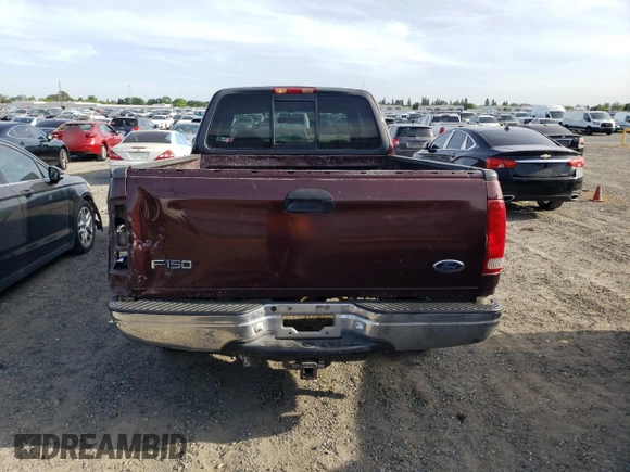 2000 Ford F-150 with VIN 1FTRX17W5YKA50203, listed as a Copart auction lot 54734615 with Not Provided miles and Salvage Title. Bid and sale history available at DreamBid. Image 6.