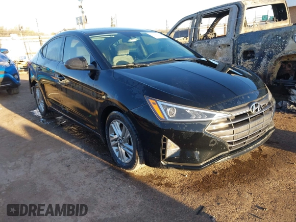 2020 Hyundai Elantra Value Edition z VIN KMHD84LF1LU956131, wystawiony jako IAAI lot #41866611 z przebiegiem 138 785 mil mil oraz . Historia ofert i sprzedaży dostępna na DreamBid. Obrazek 1.