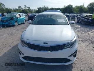 2020 Kia Optima LX with VIN 5XXGT4L30LG390927, listed as a IAAI auction lot 42642424 with 84,697 mi miles and . Bid and sale history available at DreamBid. Image 12.