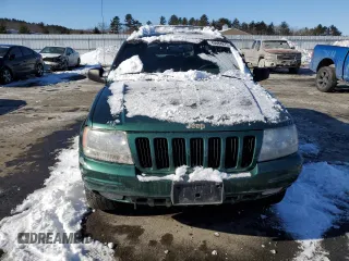 1999 Jeep Grand Cherokee Limited with VIN 1J4GW68N7XC578504, listed as a Copart auction lot 43684275 with 163,752 mi miles and Clean Title. Bid and sale history available at carsss.com. Image 5.