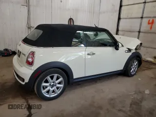 2015 MINI Convertible S с VIN WMWZP3C54F2A90956, выставлен на аукционе Copart как лот 57052545 с пробегом 39 096 миль миль и Списание • Salvage title. История ставок и продаж доступна на DreamBid. Изображение 3.