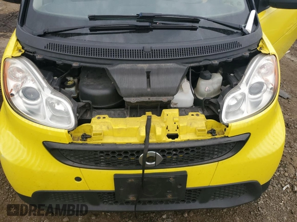 2013 Smart fortwo Pure z VIN WMEEJ3BA2DK663432, wystawiony jako Copart lot #63203755 z przebiegiem 79 786 mil mil oraz Czysty tytuł • Clean title. Historia ofert i sprzedaży dostępna na DreamBid. Obrazek 11.