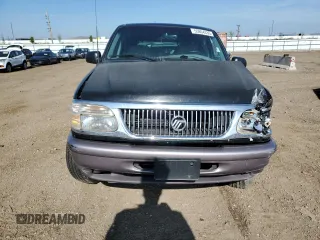 1997 Mercury Mountaineer with VIN 4M2DU55P5VUJ62435, listed as a Copart auction lot 60163465 with 105,646 mi miles and Salvage title. Bid and sale history available at DreamBid. Image 5.