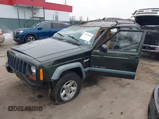 1997 Jeep Cherokee Sport with VIN 1J4FJ68SXVL582060, listed as a IAAI auction lot 41333519 with 183,580 mi miles. Bid and sale history available at carsss.com. Image 2.