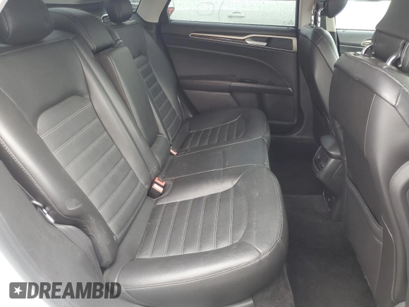 2015 Ford Fusion SE Hybrid с VIN 3FA6P0LU0FR151391, выставлен на аукционе Copart как лот 51330575 с пробегом 126 417 миль миль и Списание • Salvage title. История ставок и продаж доступна на DreamBid. Изображение 10.