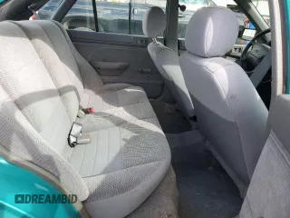 1995 Ford Escort z VIN 1FASP14J9SW128191, wystawiony jako Copart lot #75688724 z przebiegiem 85 423 mil mil oraz Tytuł czysty. Historia ofert i sprzedaży dostępna na DreamBid. Obrazek 10.