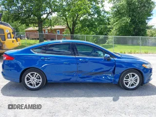 2018 Ford Fusion SE z VIN 3FA6P0LU9JR171096, wystawiony jako IAAI lot #42329683 z przebiegiem 126 463 mil mil oraz . Historia ofert i sprzedaży dostępna na DreamBid. Obrazek 13.