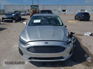 2019 Ford Fusion SEL with VIN 3FA6P0CD2KR116863, listed as a IAAI auction lot 42011256 with 72,676 mi miles. Bid and sale history available at carsss.com. Image 12.