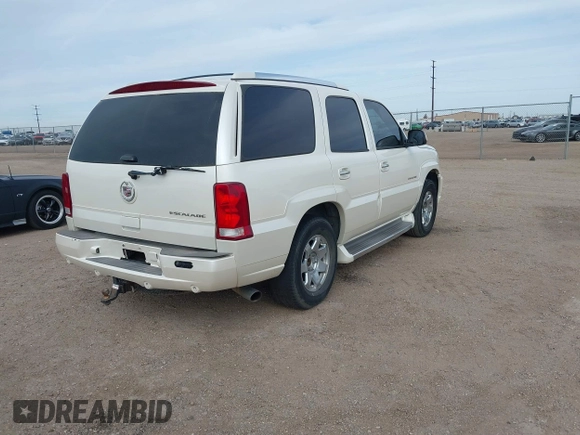 2005 Cadillac Escalade z VIN 1GYEC63T05R133618, wystawiony jako IAAI lot #41540610 z przebiegiem 212 947 mil mil oraz . Historia ofert i sprzedaży dostępna na DreamBid. Obrazek 4.